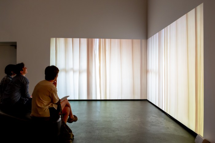 Bridie Gillman, BALI STATE OF MIND 2018 2-channel video projection installation view. Image care of Casula Powerhouse Arts Centre. Photography by Chantel Bann.jpg